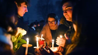 New images released as search for Brown University shooter continues