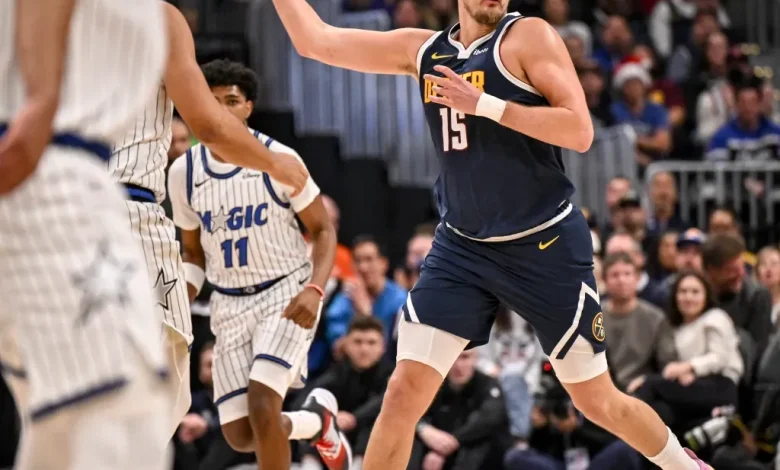 Nikola Jokic passes Kareem Abdul-Jabbar for most assists by center in NBA history as Nuggets beat Magic