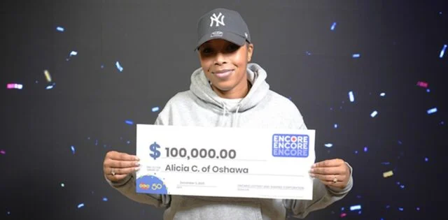 Oshawa woman wins $100,000 on a free play lottery ticket