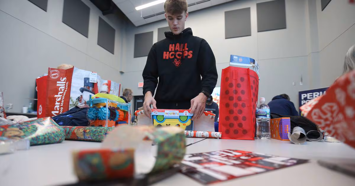 Photos: Volunteers wrap gifts for Blue and Red Christmas for Kids in Peru