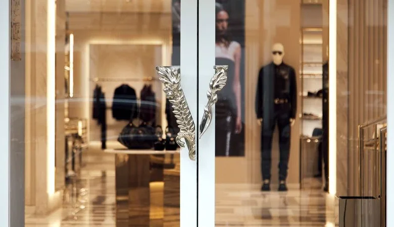 Prada completes Versace takeover after long courtship