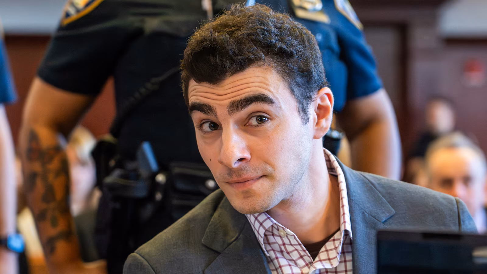 Prosecutors in pretrial hearing play 911 call that led to Luigi Mangione's arrest