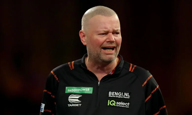 Raymond van Barneveld joked about his 'Playmobil hair' after having it tattooed on