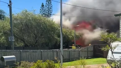 Redland Bay: Grave fears for person pulled from house fire near Brisbane