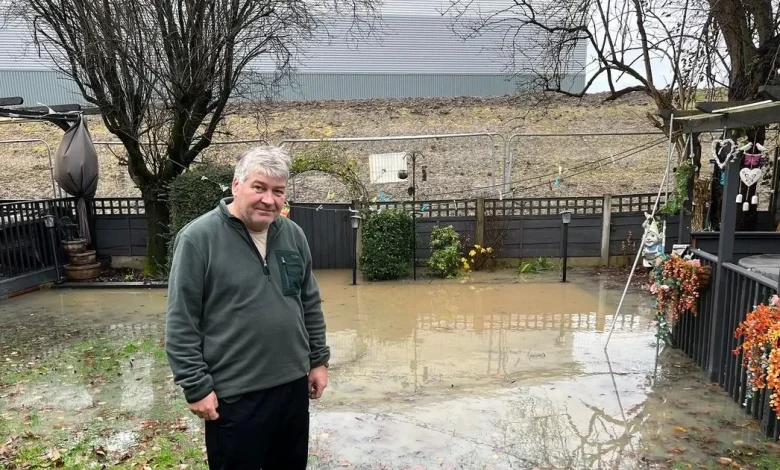 Residents battling 'cruise liner' warehouses now fighting floods as The King pitches in