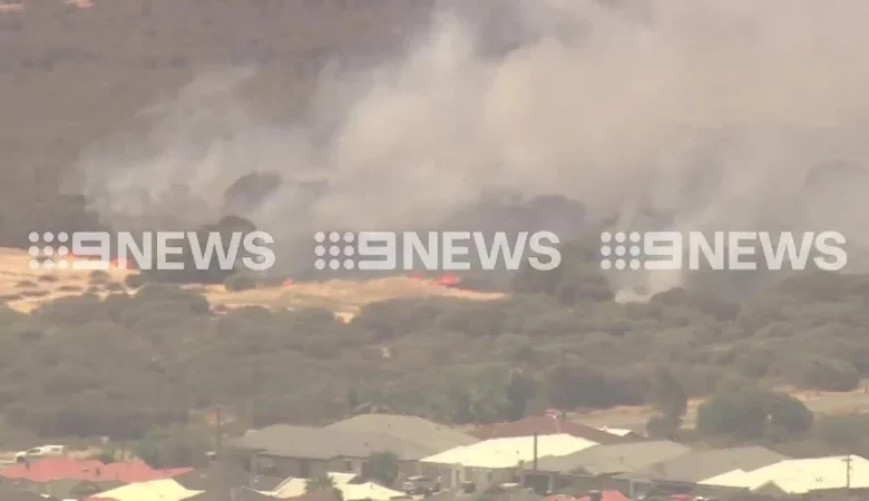 Residents urged to flee, Perth Airport flights delayed as firefighters battle bushfires