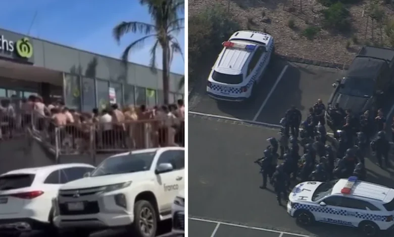 Riot police swarm Melbourne beach after youths storm supermarket, throw items at officers
