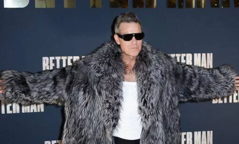 Robbie Williams' career flop in US with monkey film as he performs at 2026 World Cup draw