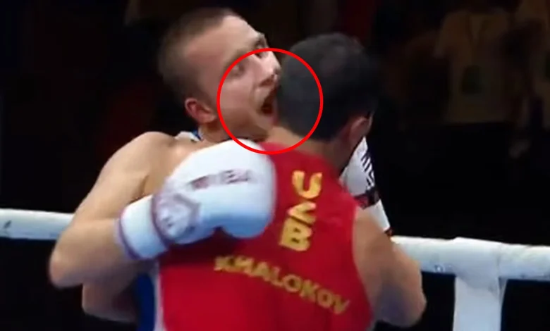 Shocking moment amateur boxer emulates Mike Tyson by biting opponent's EAR at IBA World Championships