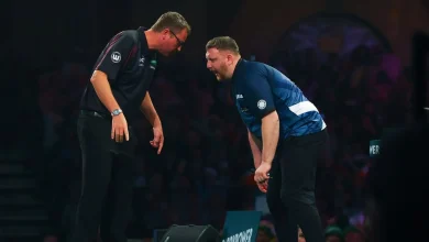 Shocking pics as darts star left bloodied at Ally Pally as he storms off stage for treatment