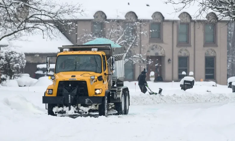 Snow, cold closes Metro Detroit schools, makes commute messy