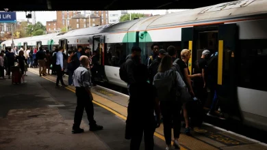 Surrey trains LIVE: London services disrupted between Clapham and Woking after 'emergency'