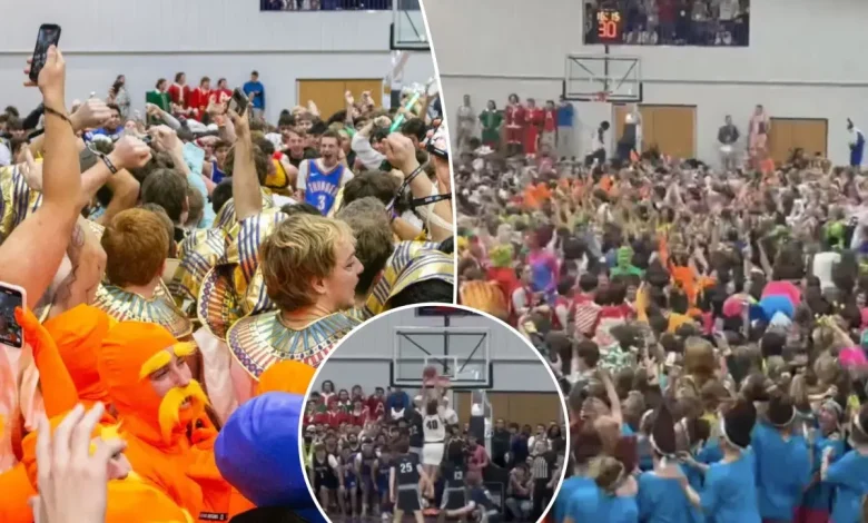 Taylor University basketball fans storm court as part of chaotic ‘Silent Night’ tradition during 118-33 win