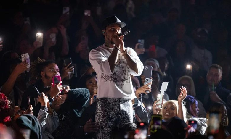 Toosii trades platinum records for Syracuse football