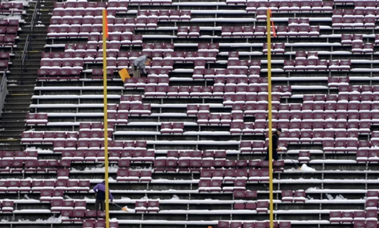 UM shoveling Washington-Grizzly Stadium to prepare for playoff game