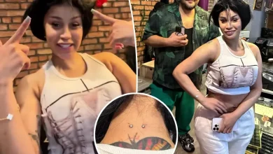 Watch Cardi B get a new set of neck and back piercings