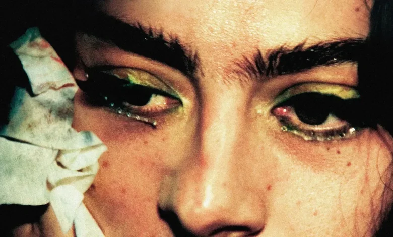 Watch Charli XCX Hide Inside a Giant Lighter in New The Moment Trailer