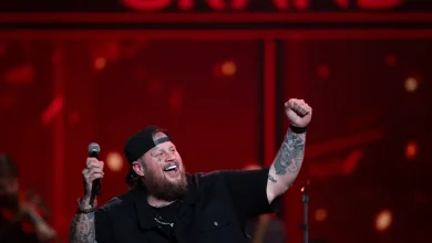 Watch Jelly Roll tearfully accept Opry invite from Craig Morgan