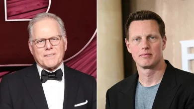 What is a hostile takeover bid?