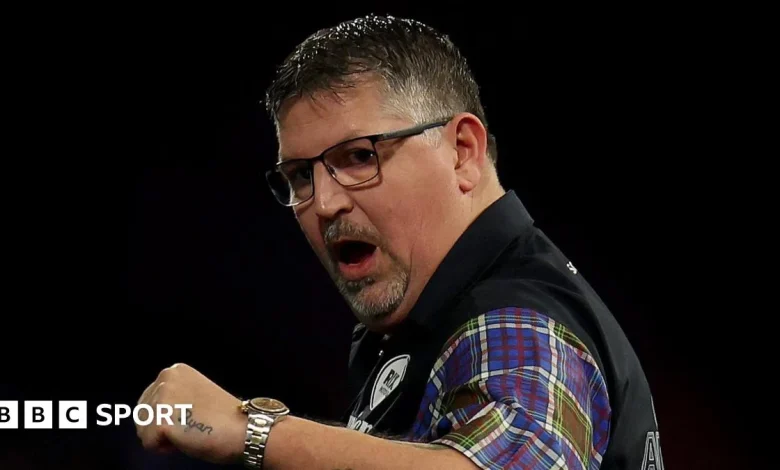 World Darts Championship: Gary Anderson battles back to reach second round with 3-2 win over Adam Hunt